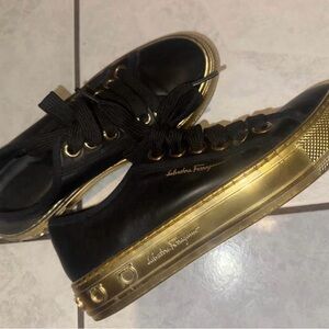 Salvatore Ferragamo Black Sneakers with Gold Trim